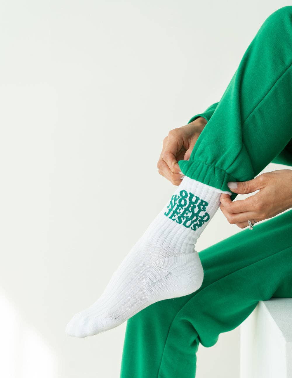 our world needs Jesus socks